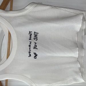 Women don’t owe you sh** white waffle tank top crop